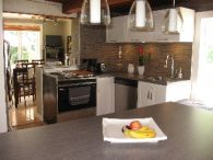 Réalisation de cuisine par Armoires BMS
Polyester - Design Charlaine Lemire